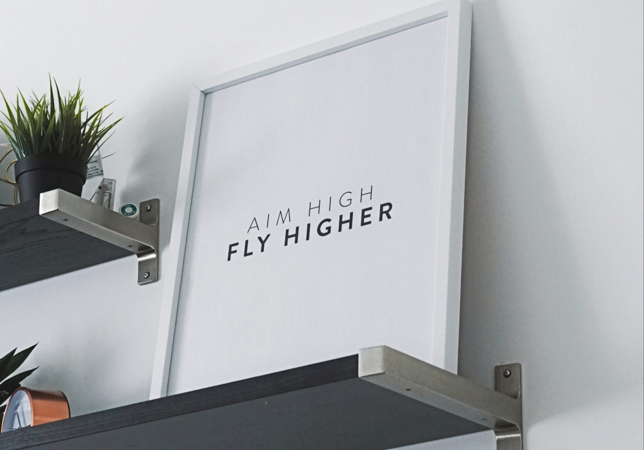 aim high, fly higher motivational poster