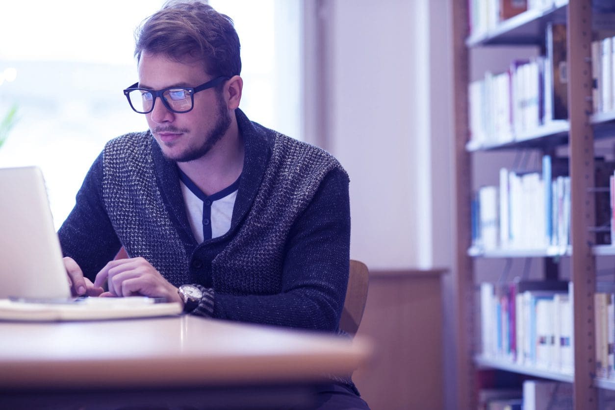 Man Watching Foundations for Apprenticeship Profitability Webinar