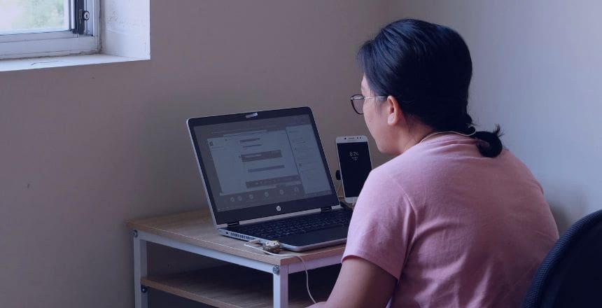Apprentice studying on a laptop