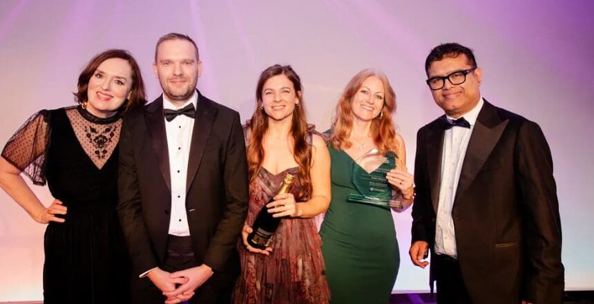 The Aptem team accepting the award