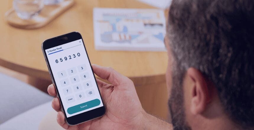 man completeing Aptem Assess number recall test